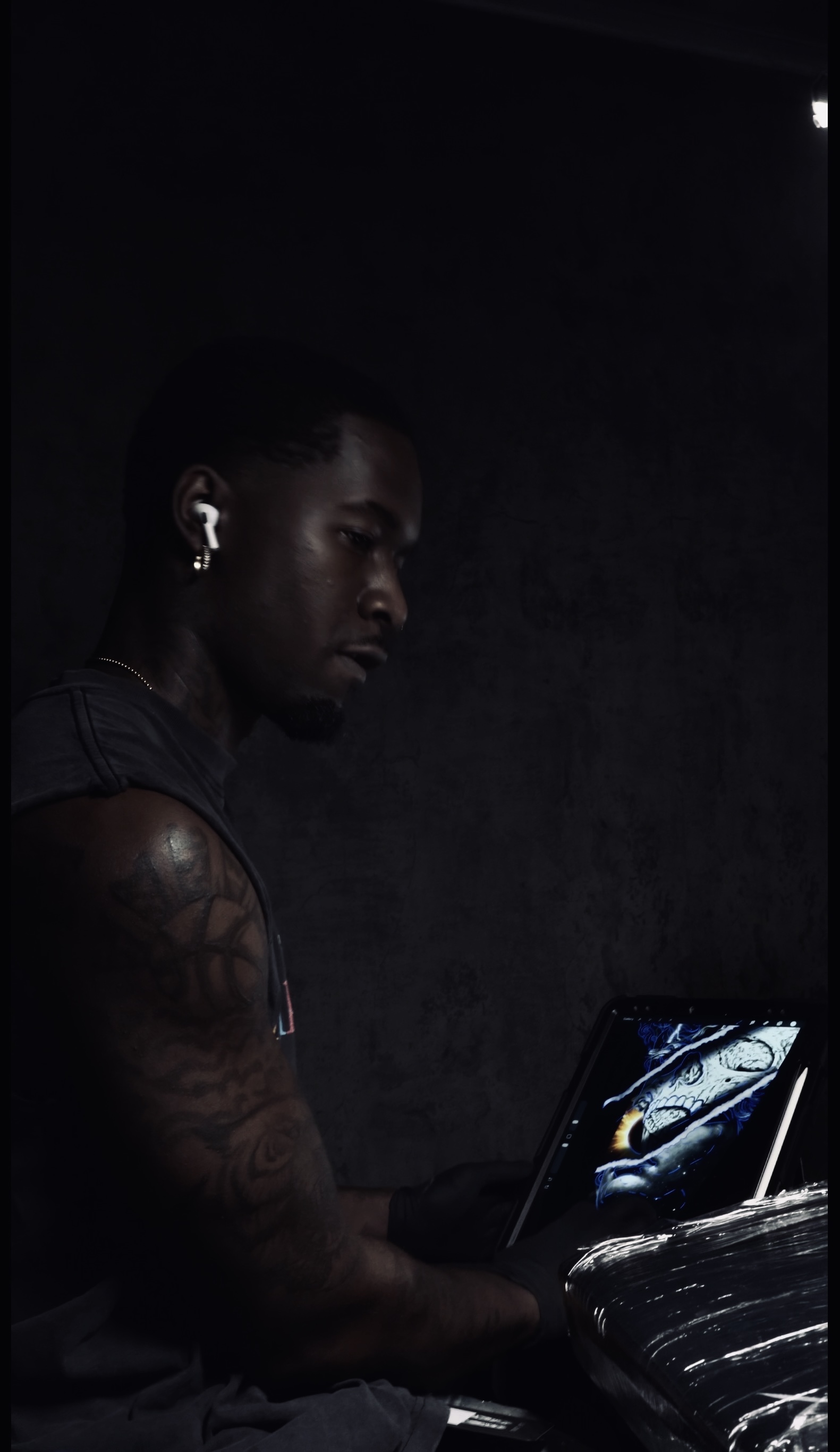 Jeremiah designing a piece on iPad